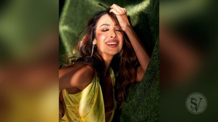 malaika in yellow dress